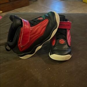 Kids Jordan Red and Black Sneakers